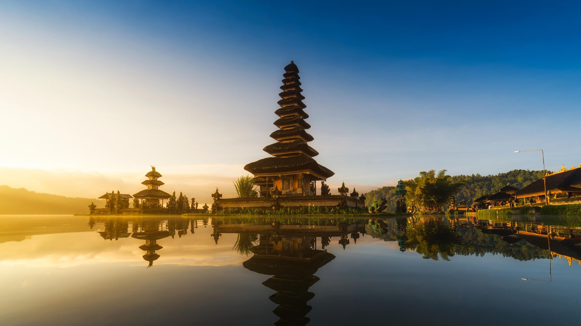 View of the iconic Beratan Temple, a renowned landmark in Bali's tourism scene, beautifully surrounded by pond.